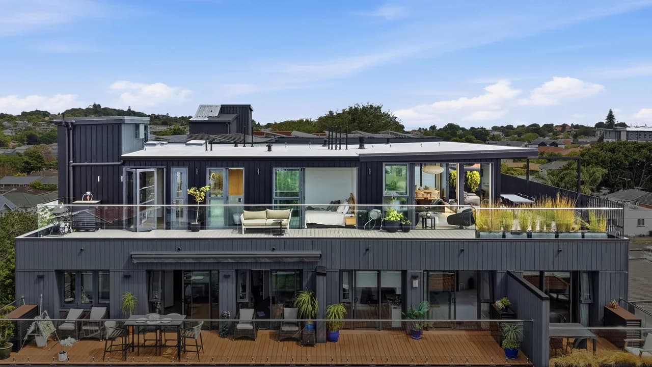 The upper levels of Logan Apartments seen from the air, with the Penthouse 505 terrace on the top level