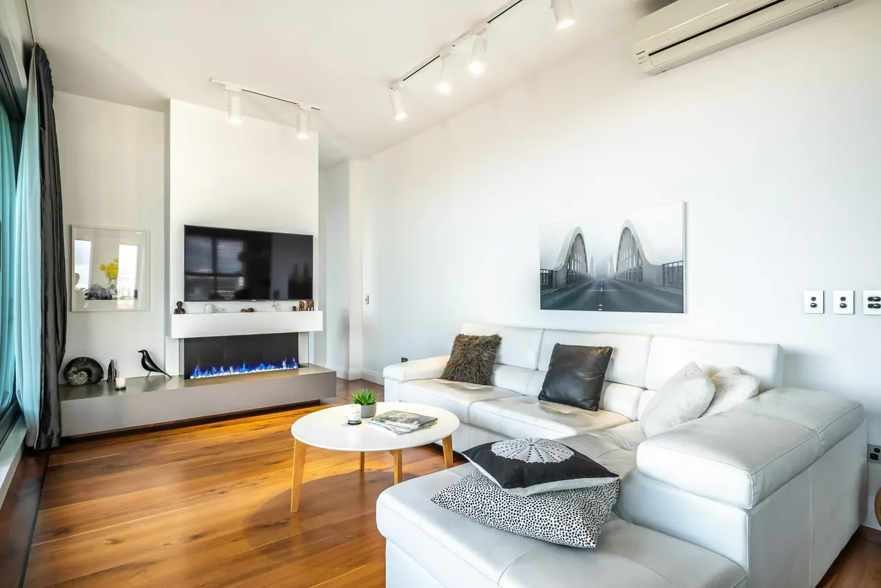 The upstairs lounge and its gas fireplace