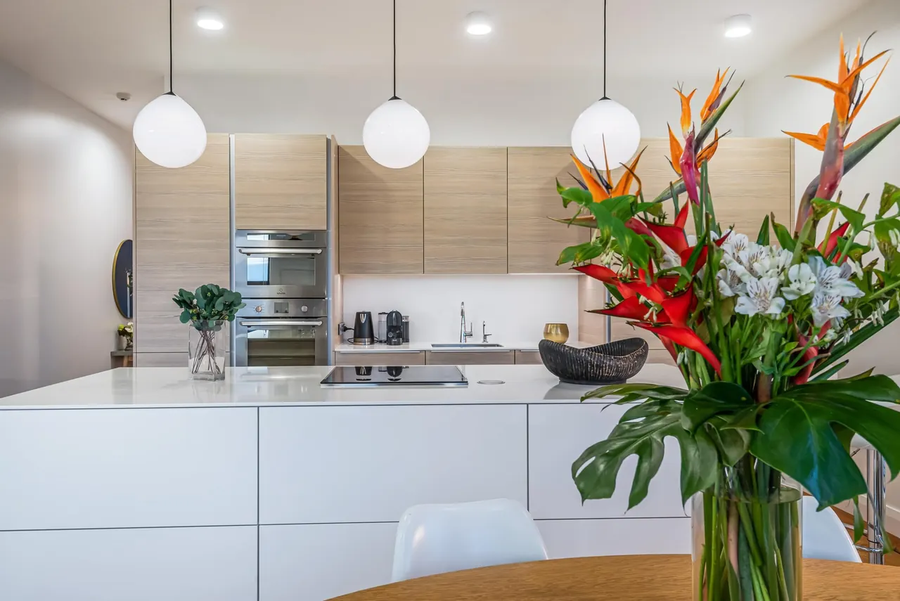 Poggenpohl kitchen cabinetry and the white stone waterfall island